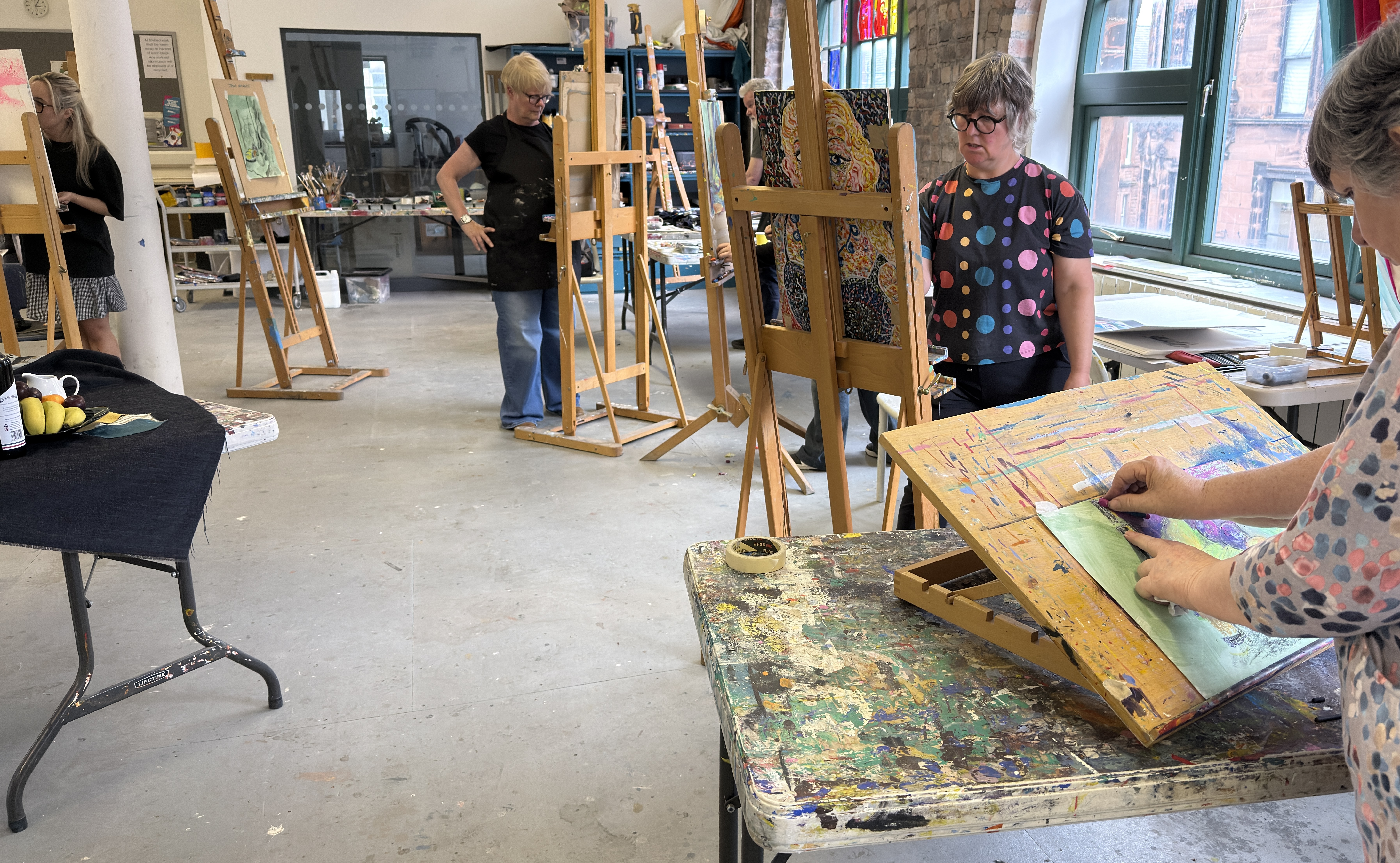 Participants working in a Teal Creatives workshop studio session.